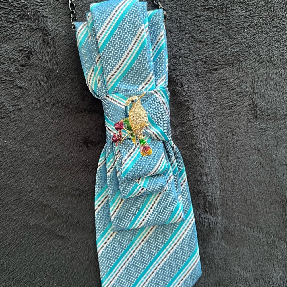 Blue Striped Tie with Parrot Brooch